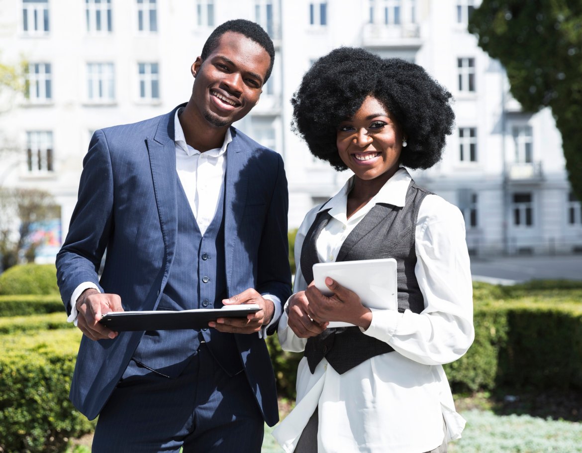 portrait-african-young-businessman-businesswoman-holding-clipboard-digital-tablet-looking-camera portrait-african-young-businessman-businesswoman-holding-clipboard-digital-tablet-looking-camera